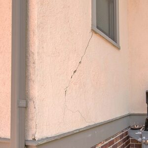 Diagonal crack on stucco exterior